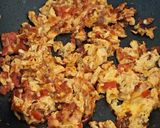 A picture of step 3 of Scrambled Eggs Toast with Tomato and Cheddar.