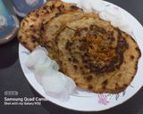 A picture of step 3 of Mooli Parathas.