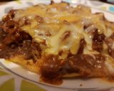 A picture of step 3 of Mexican pizza.