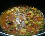 A picture of step 6 of Qeema Matar Alo.