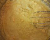 A picture of step 2 of Basbousa soaked in Orange & Honey syrup.