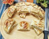 A picture of step 6 of Chicken, Cheese Bread Pockets.