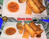A picture of step 10 of Veg Spring Rolls with homemade sheets and sauce.