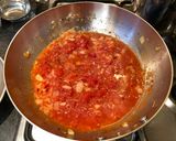 A picture of step 6 of Penne al'arrabiata (pasta with a spicy tomato sauce).