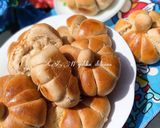 A picture of step 16 of Pumpkin shaped dinner rolls.