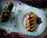 A picture of step 17 of Banana and chocolate filled  double colored braided bread.