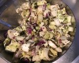 A picture of step 7 of Endive Salad with Cucumber and Red Onion in Chive Dressing.