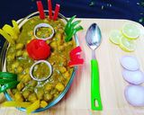 A picture of step 11 of Hariyali Chhola with butter naan.