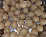 A picture of step 4 of Suji ke laddo.