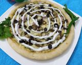 A picture of step 10 of Hot Green Chicken Pizza.