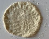 A picture of step 4 of Truffled Fontina and Mushroom Pizza.