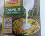 A picture of step 3 of Lauki coconut masala.