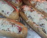 Foto del paso 4 de la receta: Perritos de pan con queso y cebolla caramelizada
