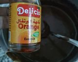 A picture of step 13 of Choco orange eclair with fresh cream...cup of hot chocolate.