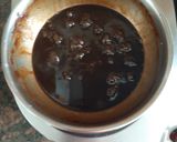 A picture of step 1 of Chocolate almonds dates.