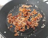 Foto del paso 6 de la receta Arroz seco de pies de cerdo, alcachofas y pimientos del padrón