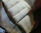 A picture of step 8 of Dominoes style garlic bread.