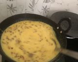 A picture of step 2 of Sour kadhi pakoda.