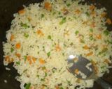 A picture of step 3 of Capsicum and carrot buttered rice.