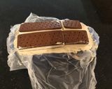A picture of step 6 of Mocha Chip Ice Cream Sandwich Layer Cake.