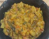 A picture of step 6 of Lauki coconut masala.