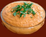 A picture of step 2 of Hummus stuffed cheesy mushrooms.