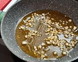 Foto del paso 2 de la receta: Espaguetis al ajillo con taquitos de jamón