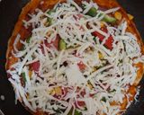 A picture of step 3 of Veg Cheesy Pizza.
