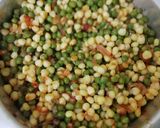 A picture of step 6 of Soft maize with green peas.