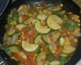 A picture of step 7 of Mexican style zucchini.