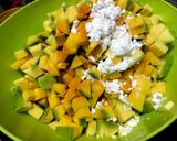 A picture of step 1 of Raw Mango jaggery pickle.