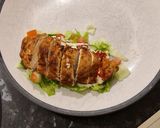 A picture of step 5 of Chipotle Chicken with Chilli Jam salad bed.