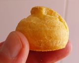 Foto del paso 5 de la receta: Miniprofiteroles rellenos de crema de limón con cobertura de toffee y crocanti