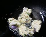 A picture of step 2 of Ulli vada (food snack of kerelian popular street food.).
