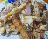 Foto del paso 8 de la receta: Papas rústicas, tiras de carne, jamón, huevo, queso y cebollas