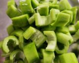 A picture of step 1 of Snake gourd ki sabji.