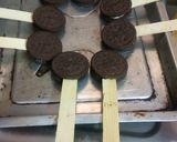 A picture of step 2 of Oreo buiscuit chocolate lollipops.