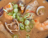Foto del paso 9 de la receta: Estofado de alcachofas, almejas y langostinos