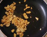 A picture of step 2 of Dryfruit coconut paak(wadi).