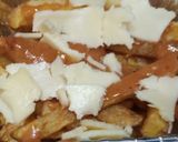 A picture of step 5 of Chessy pizza fries.