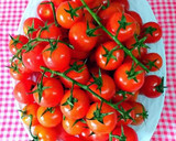 Foto del paso 1 de la receta: Confitura de tomates baby en rama con toques de clementinas