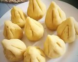 A picture of step 24 of Puran poli modak.