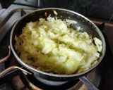A picture of step 4 of Cucumber raita.