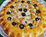 A picture of step 6 of Cheesy Bites Tikka Pizza 🍕🍕.