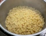 Une image de l'étape 7 de Gratin de gnochettis aux épinards, lard et tomates.