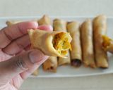 A picture of step 7 of Chicken springrolls.