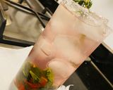 A picture of step 3 of Pink Petal Gin and Tonic.