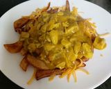 A picture of step 9 of My Chicken Curry over Cheesey Chips 😋.