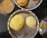 A picture of step 3 of Achari alu kadi rice.