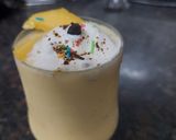 A picture of step 6 of Mango Shake with ice cream.